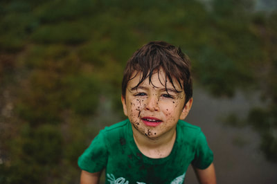 playing in the mud long island boy photo session 
