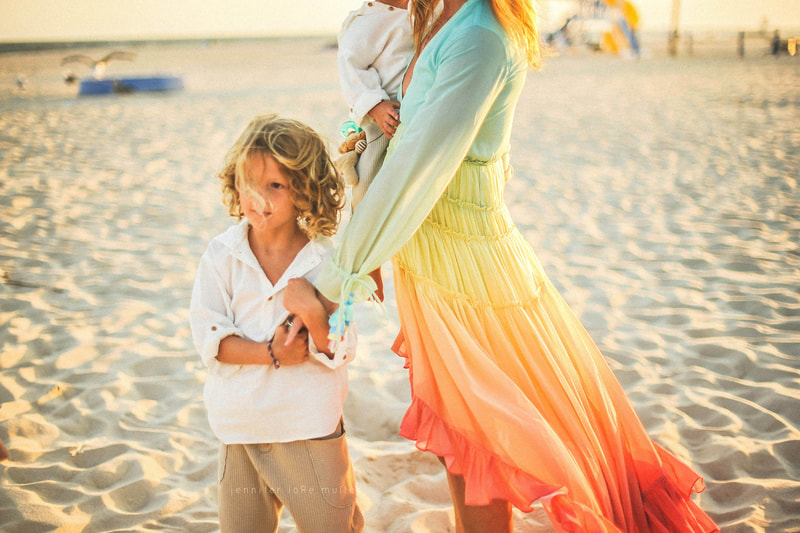family beach photo session long island mom in beautiful rainbow dress